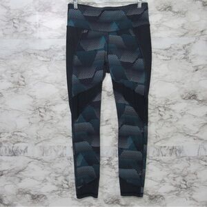 Athleta Blue Kinetic Leggings Stealth Mesh Detail
Size Medium Style 591391